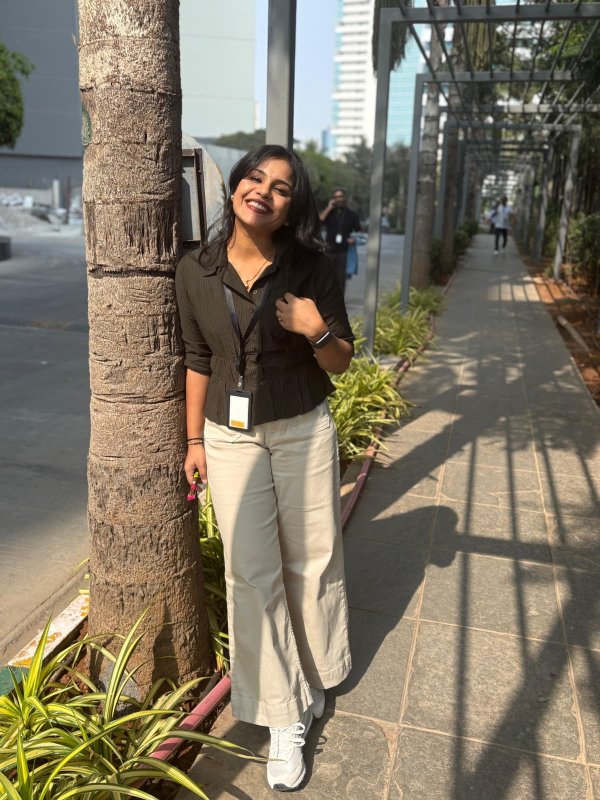 Supriya smiling outdoors
